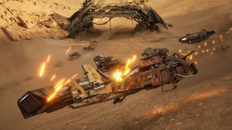 Two racers grinding hulls in a desert dust storm beside crashed wreckage